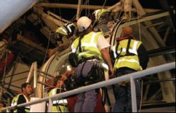 Preparing to wrap a London Eye Capsule